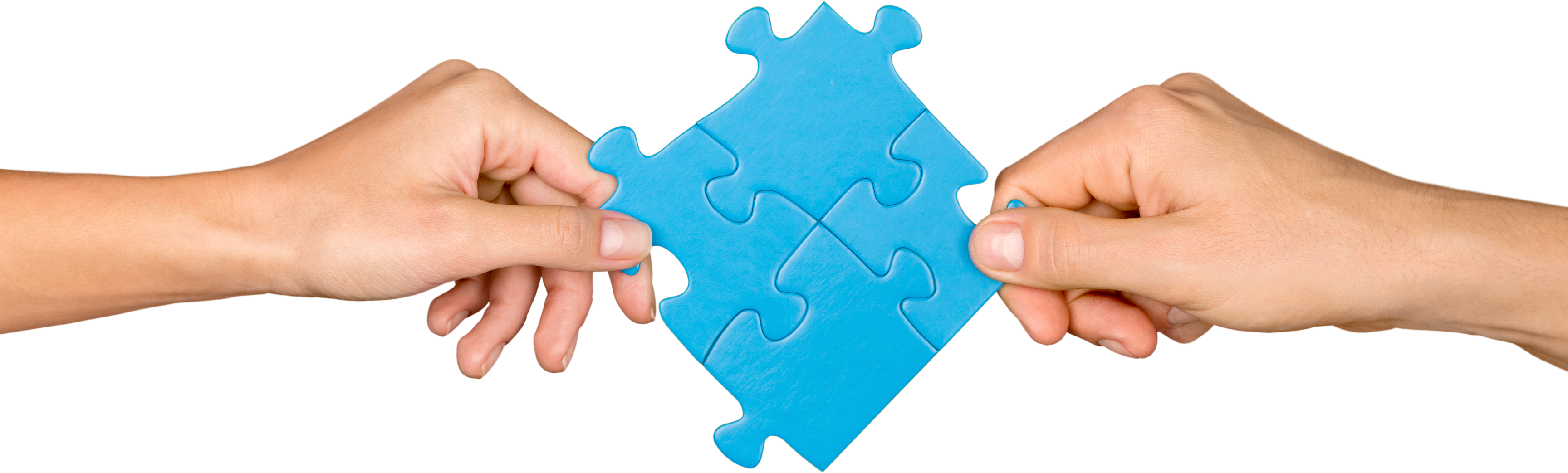 Hands Combining Puzzle Pieces Together